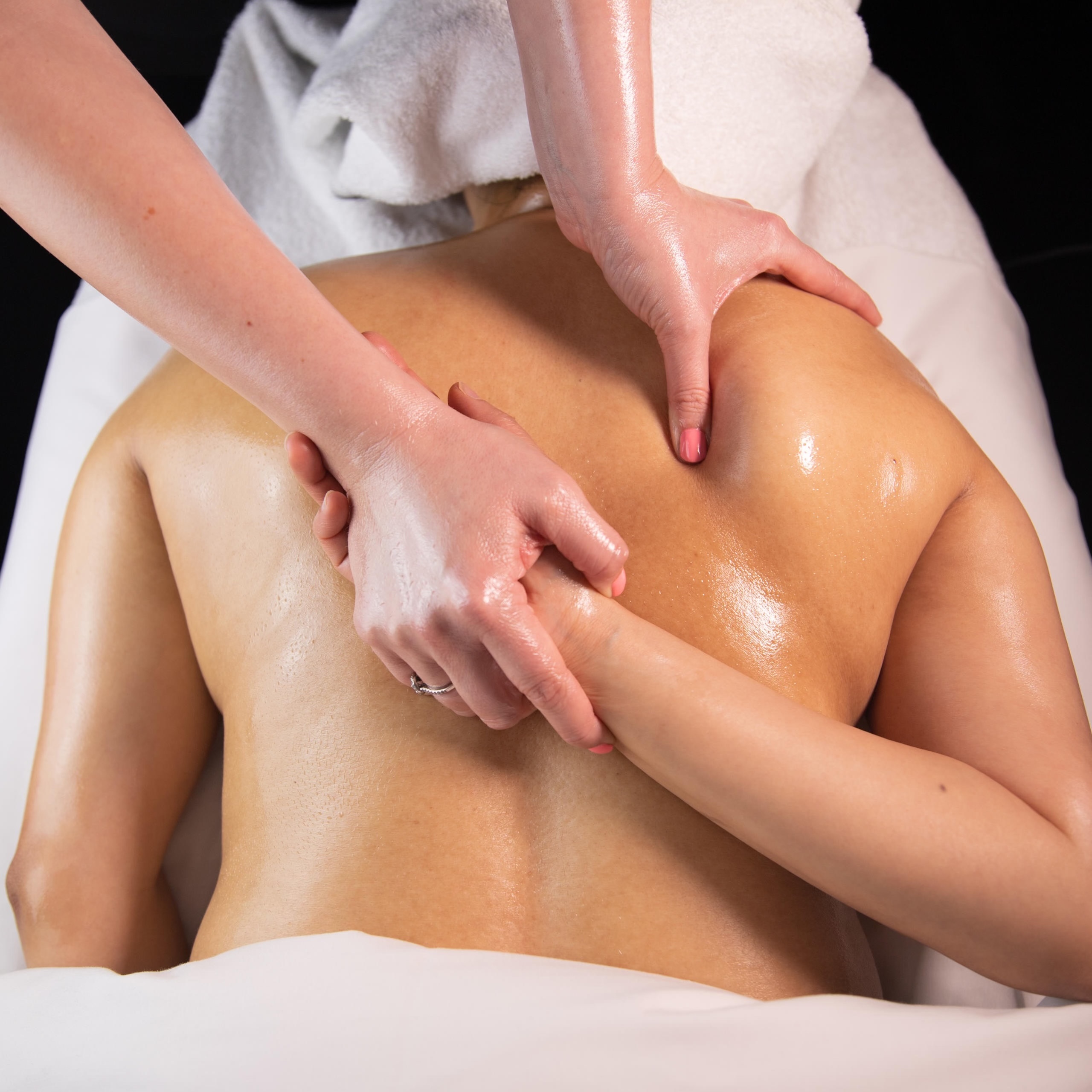 Deep tissue massage session targeting back muscles at Heavenly Serenity in Granger, IN
